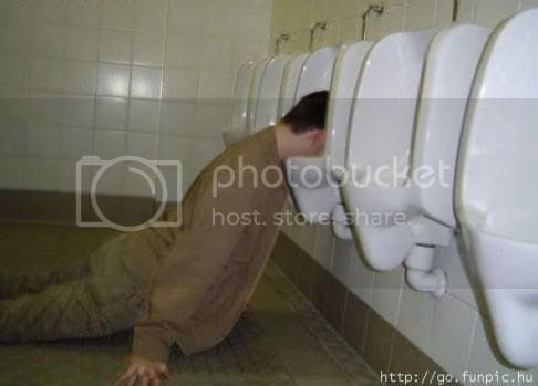 toilet-humor-passed-out-in-urinal.jpg