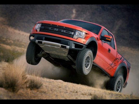 2010-Ford-F-150-SVT-Raptor-Jumping-1280x960.jpg