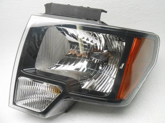 50-raptor-lh-halogen-headlamp-headlight-black-trim.jpg