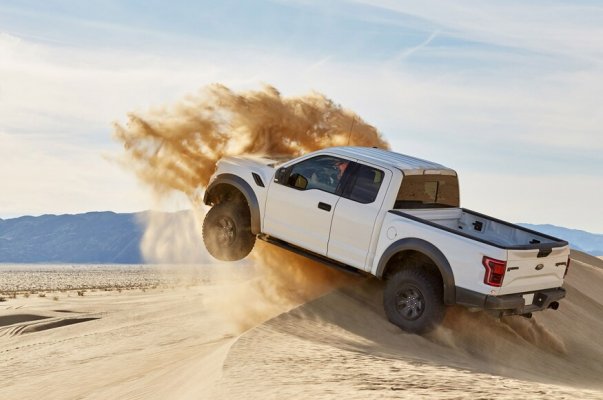 2017-ford-f-150-raptor-jumping-dune-2.jpg