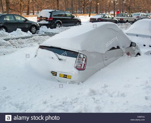prius-car-buried-in-a-snow-pile-C2MTAJ.jpg