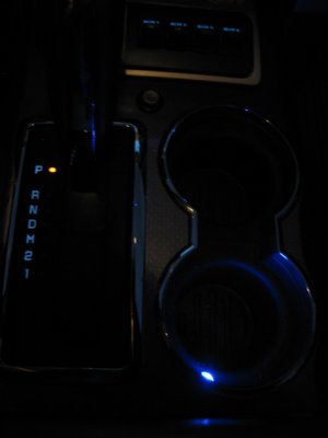 Blue light - button in front of shifter.jpg